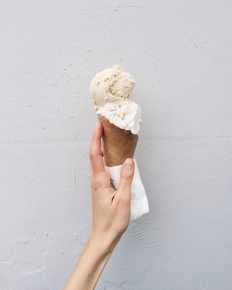 White soft serve ice cream cone